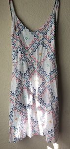 White dress with colorful patterns